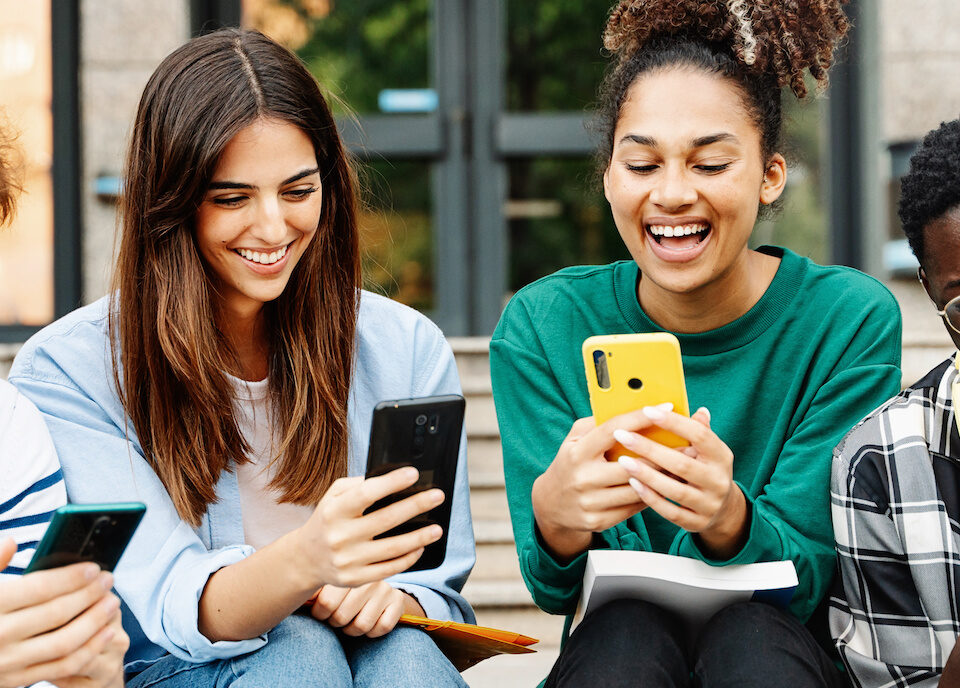 Students voting online on their phones in an SRC election